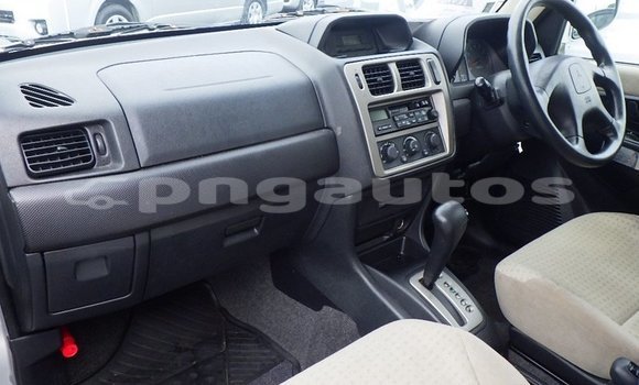 Buy Import Mitsubishi Pajero iO Silver Car in Port Moresby in National Capital District Buy Import Mitsubishi Pajero iO Silver Car in Port Moresby in National Capital District