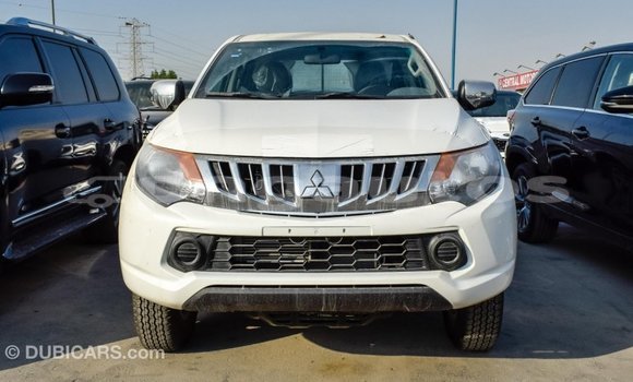 Buy Import Mitsubishi L200 White Car in Import - Dubai in Enga Buy Import Mitsubishi L200 White Car in Import - Dubai in Enga