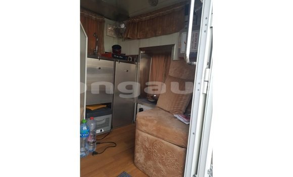 Buy Import Kia Carens White Car in Import - Dubai in Enga Buy Import Kia Carens White Car in Import - Dubai in Enga