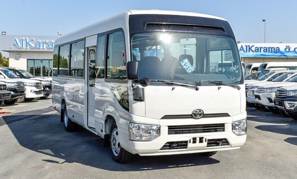 Acheter Import Voiture Toyota Coaster Blanc à Import - Dubai, Enga Acheter Import Voiture Toyota Coaster Blanc à Import - Dubai, Enga