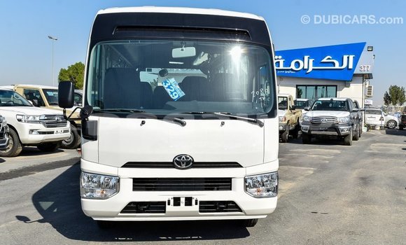 Acheter Import Voiture Toyota Coaster Blanc à Import - Dubai, Enga Acheter Import Voiture Toyota Coaster Blanc à Import - Dubai, Enga