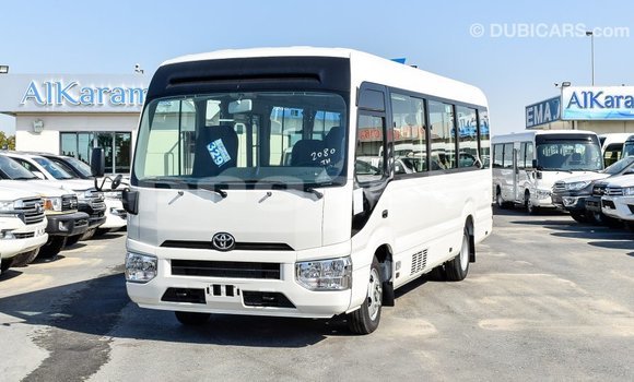 Acheter Import Voiture Toyota Coaster Blanc à Import - Dubai, Enga Acheter Import Voiture Toyota Coaster Blanc à Import - Dubai, Enga