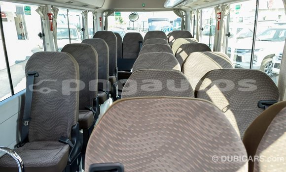 Acheter Import Voiture Toyota Coaster Blanc à Import - Dubai, Enga Acheter Import Voiture Toyota Coaster Blanc à Import - Dubai, Enga