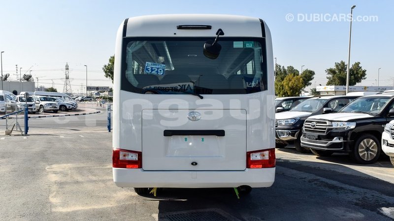 Big with watermark toyota coaster enga import dubai 4427