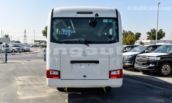 Acheter Import Voiture Toyota Coaster Blanc à Import - Dubai, Enga Acheter Import Voiture Toyota Coaster Blanc à Import - Dubai, Enga