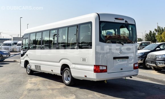 Acheter Import Voiture Toyota Coaster Blanc à Import - Dubai, Enga Acheter Import Voiture Toyota Coaster Blanc à Import - Dubai, Enga
