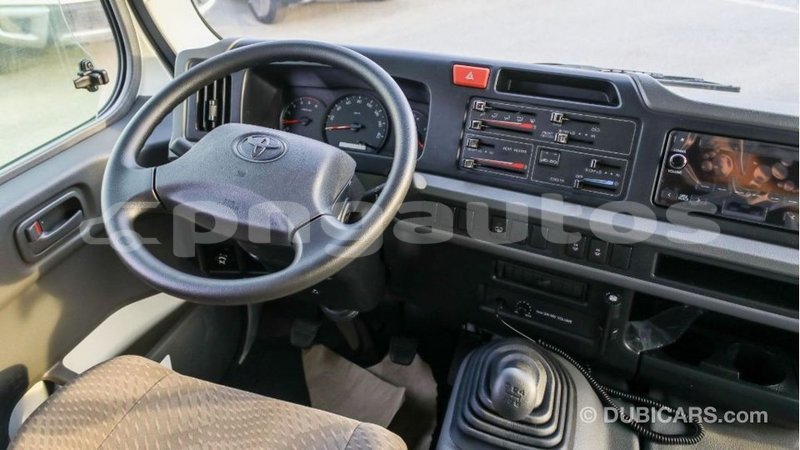 Big with watermark toyota coaster enga import dubai 4975