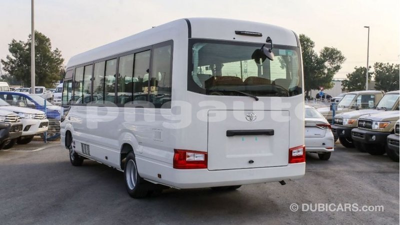 Big with watermark toyota coaster enga import dubai 4975