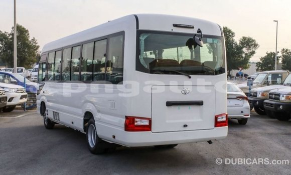 Acheter Import Voiture Toyota Coaster Blanc à Import - Dubai, Enga Acheter Import Voiture Toyota Coaster Blanc à Import - Dubai, Enga