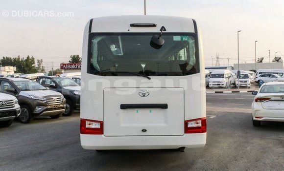 Acheter Import Voiture Toyota Coaster Blanc à Import - Dubai, Enga Acheter Import Voiture Toyota Coaster Blanc à Import - Dubai, Enga