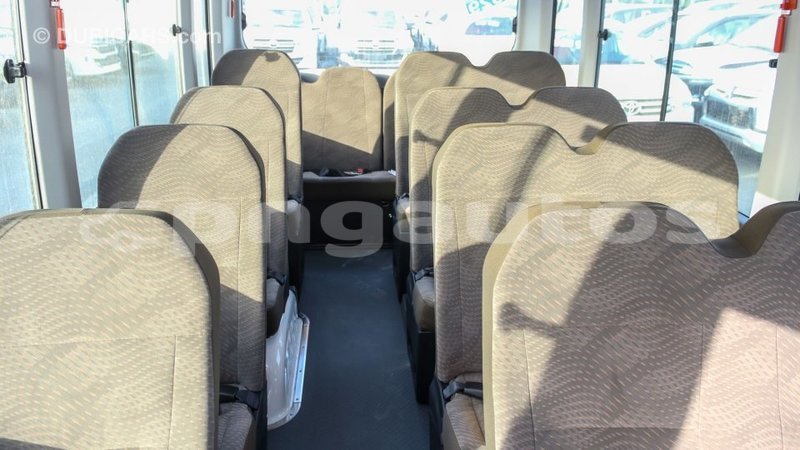 Big with watermark toyota coaster enga import dubai 4979