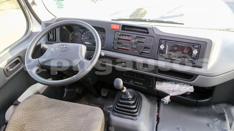 Big with watermark toyota coaster enga import dubai 4979