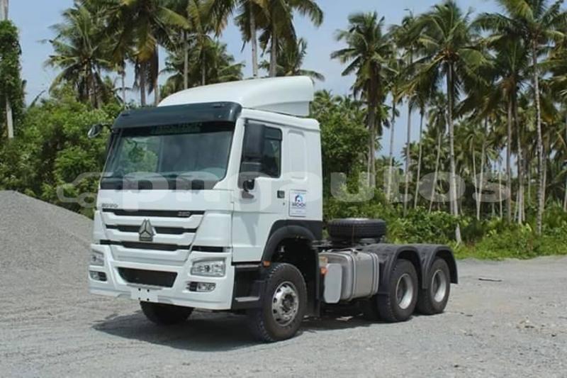 Big with watermark sino howo morobe lae 5002