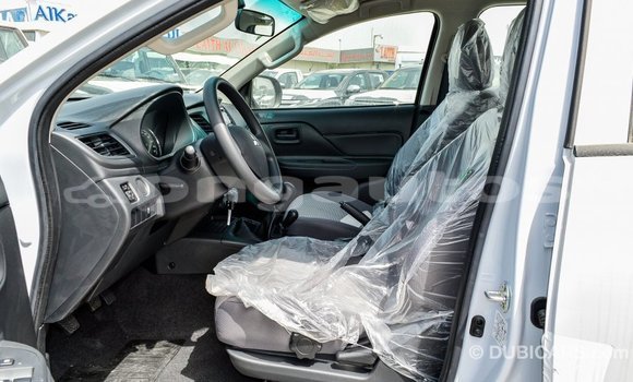 Buy Import Mitsubishi L200 White Car in Import - Dubai in Enga Buy Import Mitsubishi L200 White Car in Import - Dubai in Enga