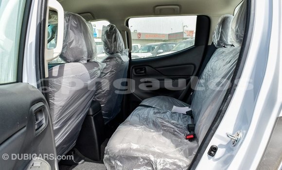 Buy Import Mitsubishi L200 White Car in Import - Dubai in Enga Buy Import Mitsubishi L200 White Car in Import - Dubai in Enga