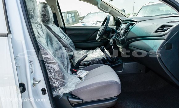 Buy Import Mitsubishi L200 White Car in Import - Dubai in Enga Buy Import Mitsubishi L200 White Car in Import - Dubai in Enga