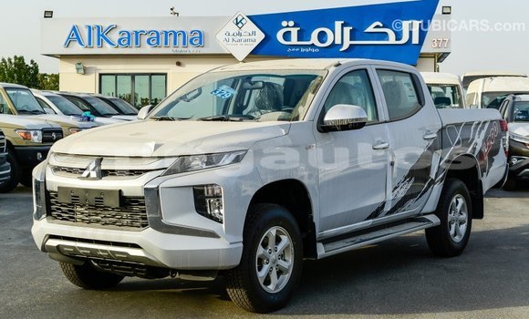 Buy Import Mitsubishi L200 White Car in Import - Dubai in Enga Buy Import Mitsubishi L200 White Car in Import - Dubai in Enga