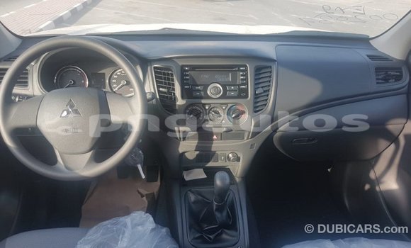 Buy Import Mitsubishi L200 White Car in Import - Dubai in Enga Buy Import Mitsubishi L200 White Car in Import - Dubai in Enga