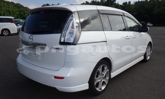 Buy Used Mazda Mazda Premacy White Car in Port Moresby in National Capital District Buy Used Mazda Mazda Premacy White Car in Port Moresby in National Capital District