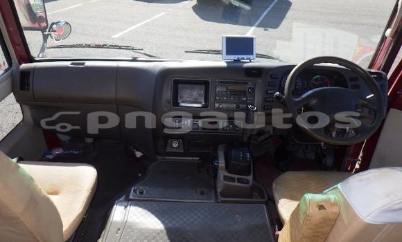 Buy Used Mitsubishi Rosa Red Car in Port Moresby in National Capital District Buy Used Mitsubishi Rosa Red Car in Port Moresby in National Capital District