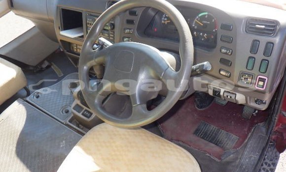 Buy Used Mitsubishi Rosa Red Car in Port Moresby in National Capital District Buy Used Mitsubishi Rosa Red Car in Port Moresby in National Capital District