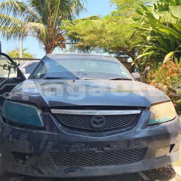 Big with watermark mazda 323 milne bay alotau 8226